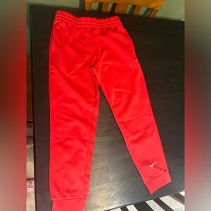 Red Nike Therma-Fit jogger pants brand new with tags youth large